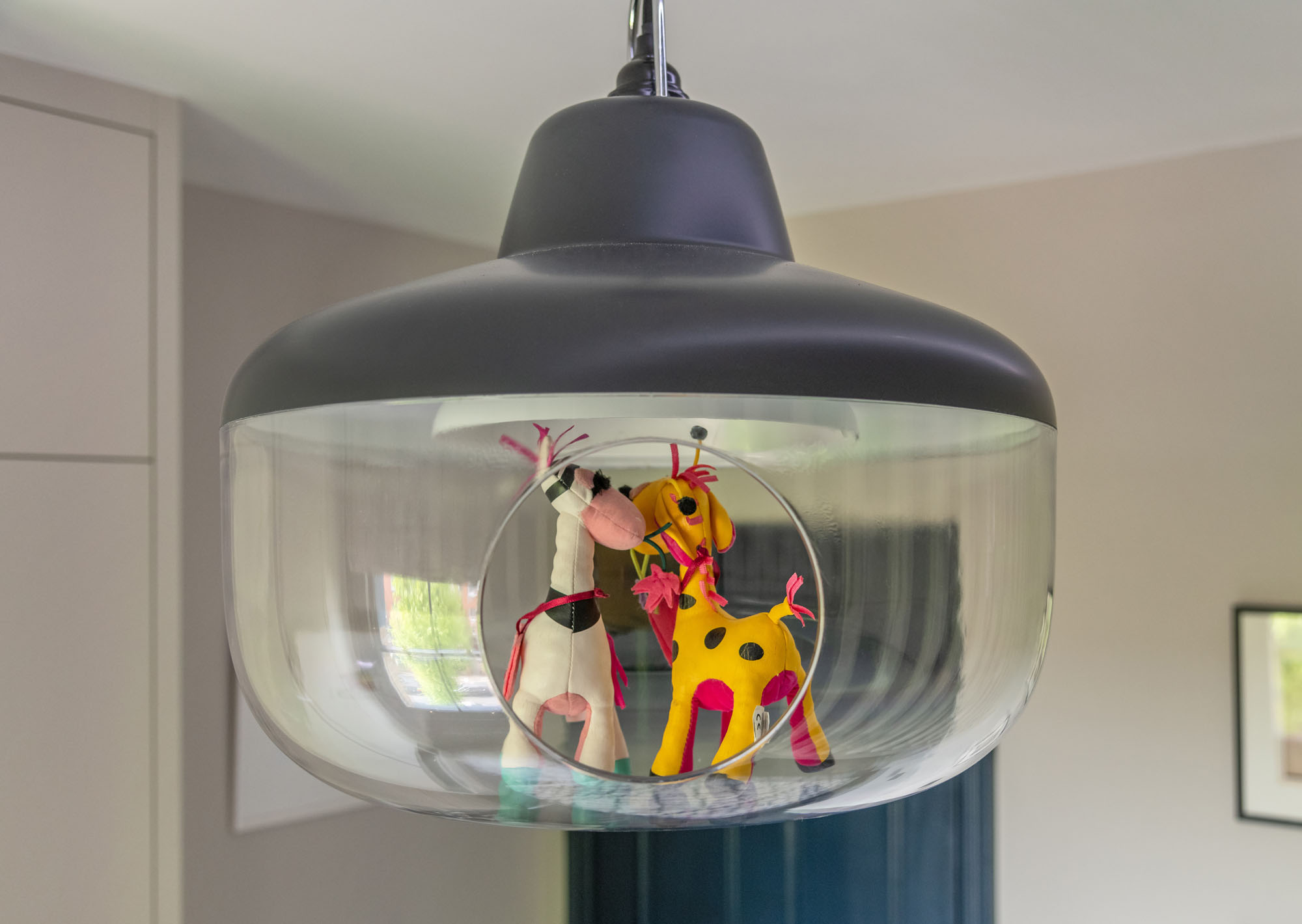 Contemporary Hampstead boy’s bedroom designed by Funky Little Darlings, featuring the ENO Studio Favourite Things pendant light allowing you can add little toys to personalise adding a playful design element.