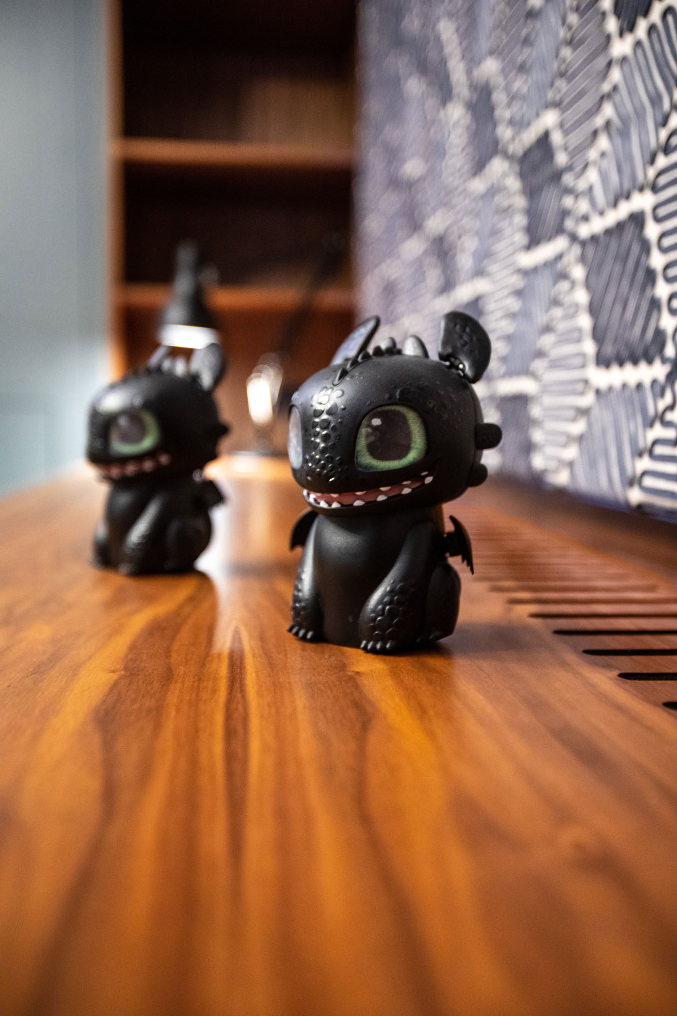 Hampstead boy’s bedroom designed by Funky Little Darlings, featuring a custom walnut desk and electric Roman blinds upholstered in Harlequin Cupola fabric for a modern, stylish children’s space.