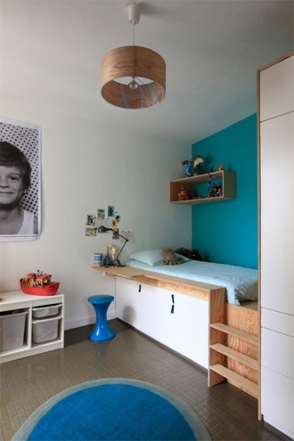 Platform bed in blue room