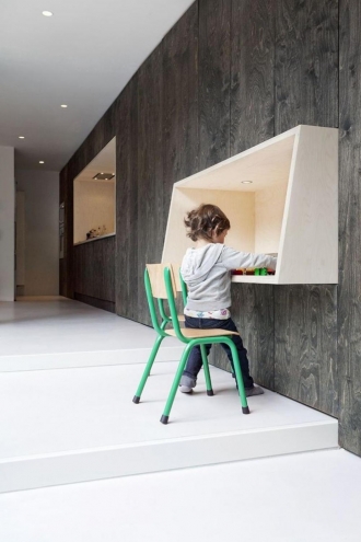 Wall mounted desk in playroom