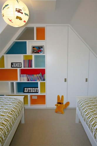 Built in wardrobes, storage, cool colours in children's bedroom