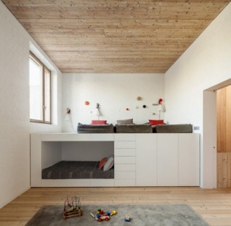 White platform bed with built in storage