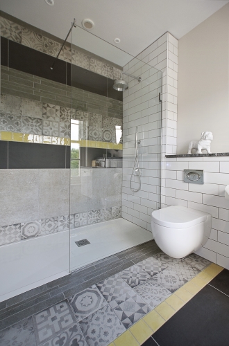 Girl's bathroom, grey and yellow tiled bathroom
